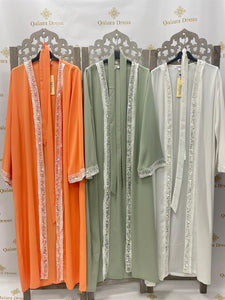 Kimono ramadan eid vibes style soie de medine leger avec des sequins comme détails plusieurs coloris disponibles noir blanc beige orange vert 