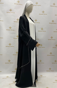 Kimono noir perlee luxe Dubaï tissu haute qualite avec volants mode modest fashion sous robe blanche qalam dress 