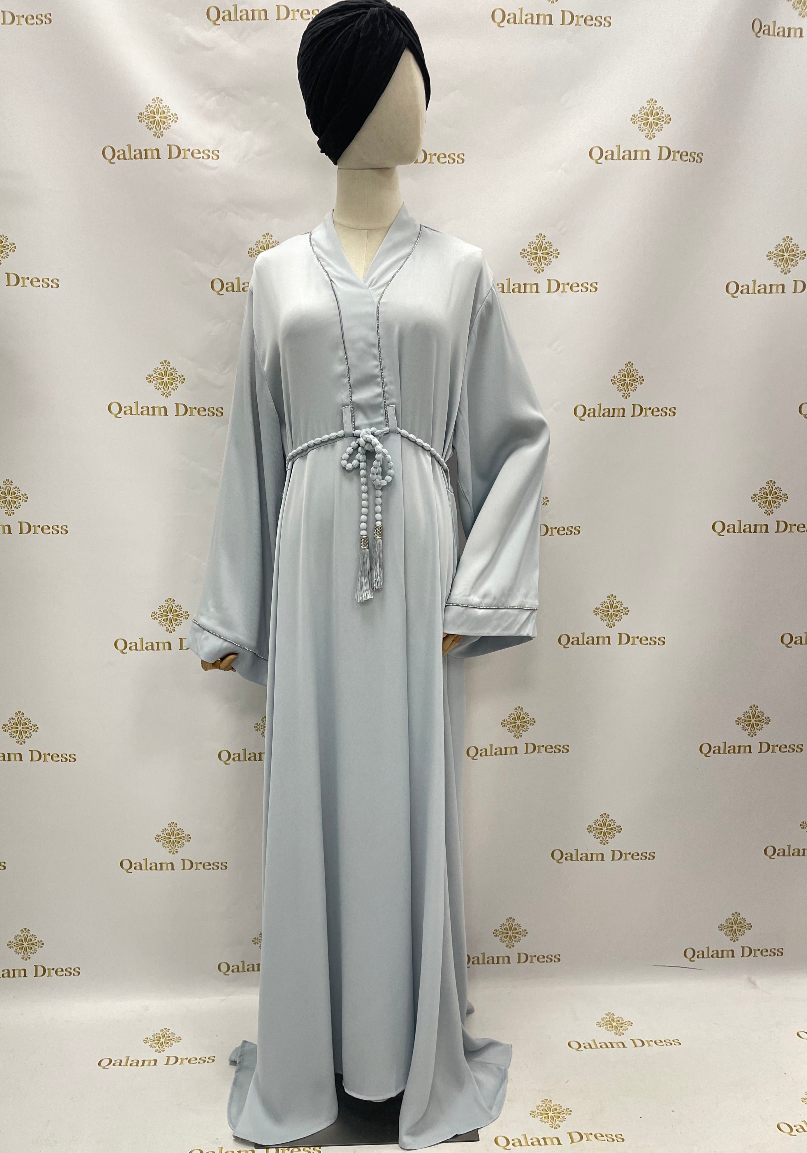 Robe confort evasee baby blue avec ceinture elastique details strass manches qalam dress boutique creteil 