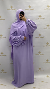 abaya ou robe de priere a enfiler tres pratique avec manches ballons tissu leger en soie de medine vert indigo ou lila tendance hijab 