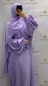 abaya ou robe de priere a enfiler tres pratique avec manches ballons tissu leger en soie de medine lila tendance hijab 